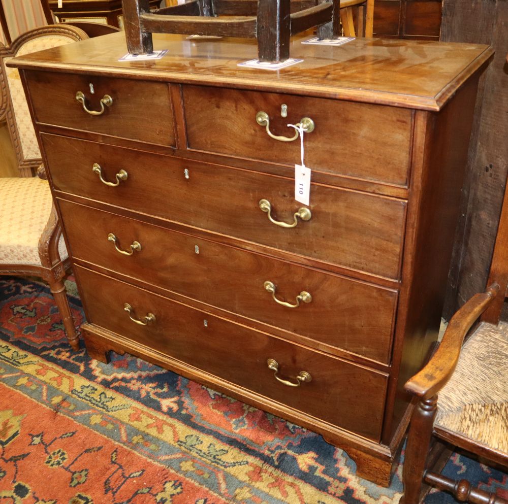 A George III chest of four long drawers, W.100cm, D.44cm, H.94cm